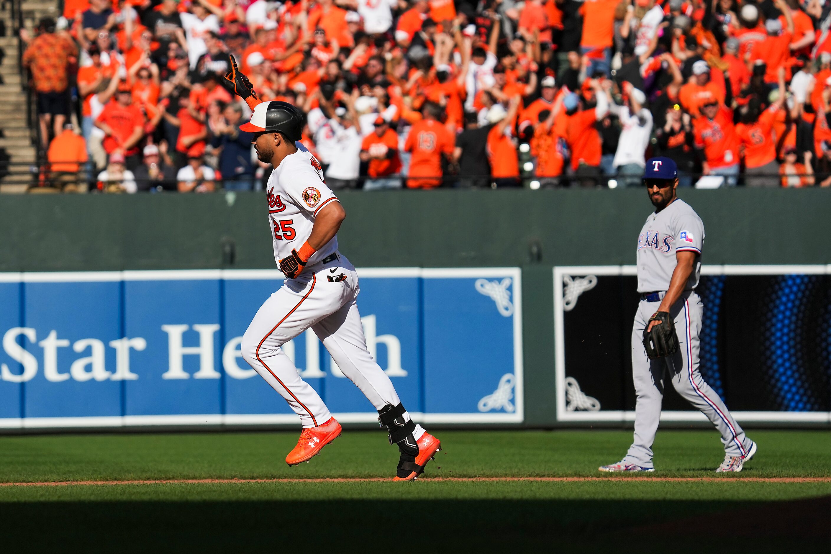 Baltimore Orioles designated hitter Anthony Santander (25) rounds the bases past Texas...