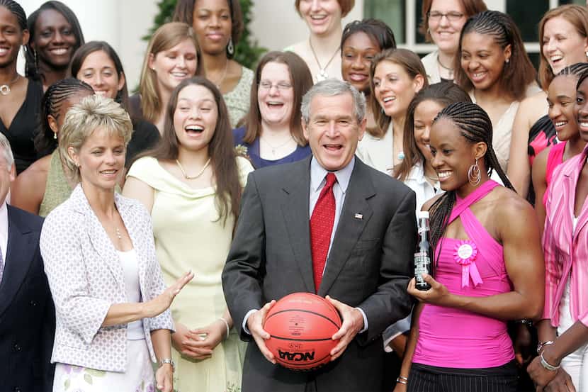 President Bush, Baylor coach Kim Mulkey-Robertson, left, and members of the 2005 NCAA...