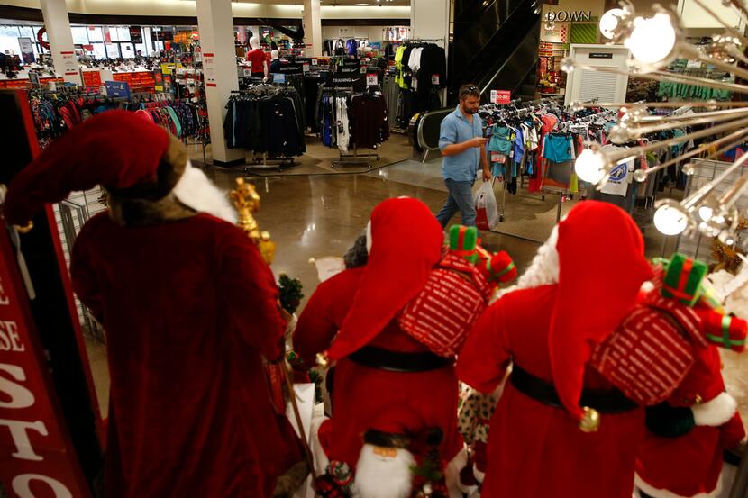 C.F. Huff walks through the holiday section of J.C. Penney at Collin Creek Mall in Plano.