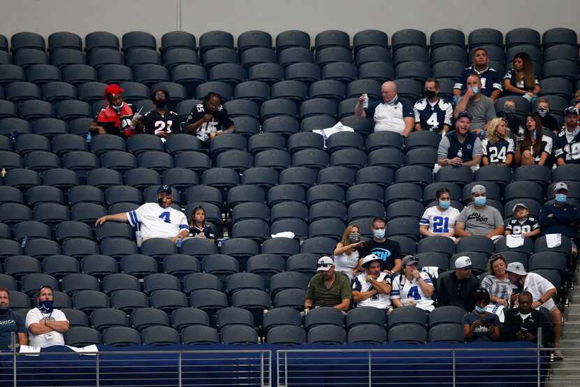 Dallas Cowboys fans watch the game between the Dallas Cowboys and Atlanta Falcons in the...