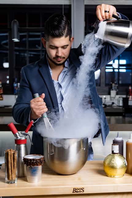 Julian Rodarte, CEO of Trinity Groves, uses liquid nitrogen to prepare milkshake at new...