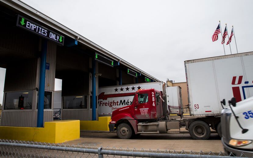 Trucks pass through the World Trade Bridge from the U.S. in to Mexico on Thursday, January...