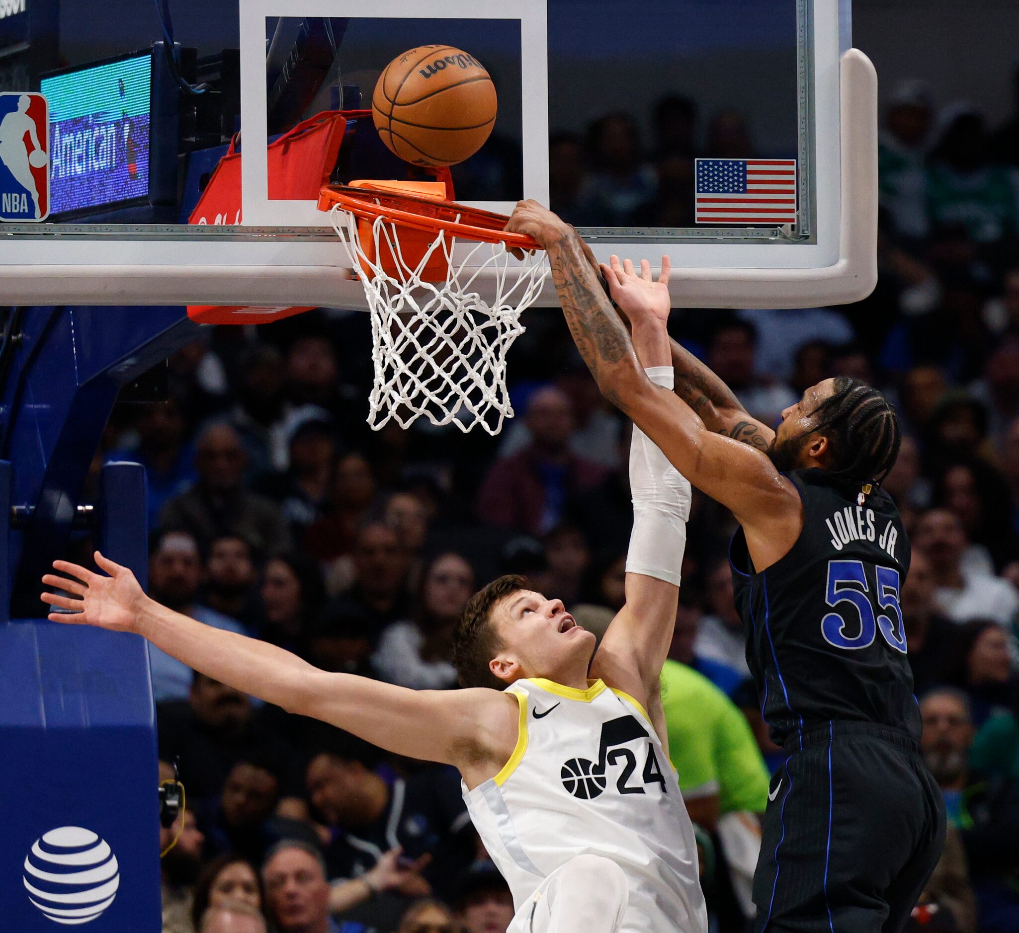 Dallas Mavericks forward Derrick Jones Jr. (55) misses a dunk after being fouled by Utah...