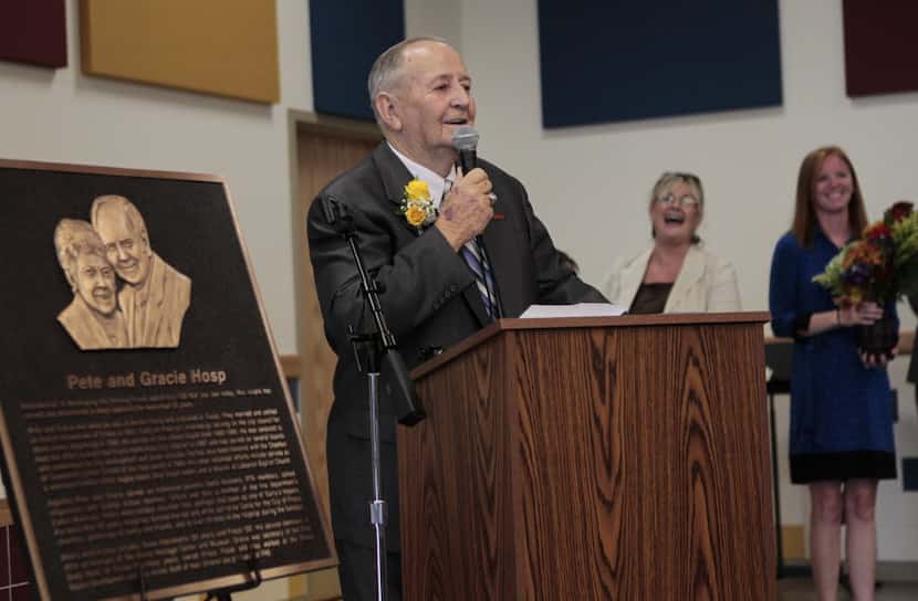 Pete Hosp speaks during a dedication ceremony for the new elementary school named after him...