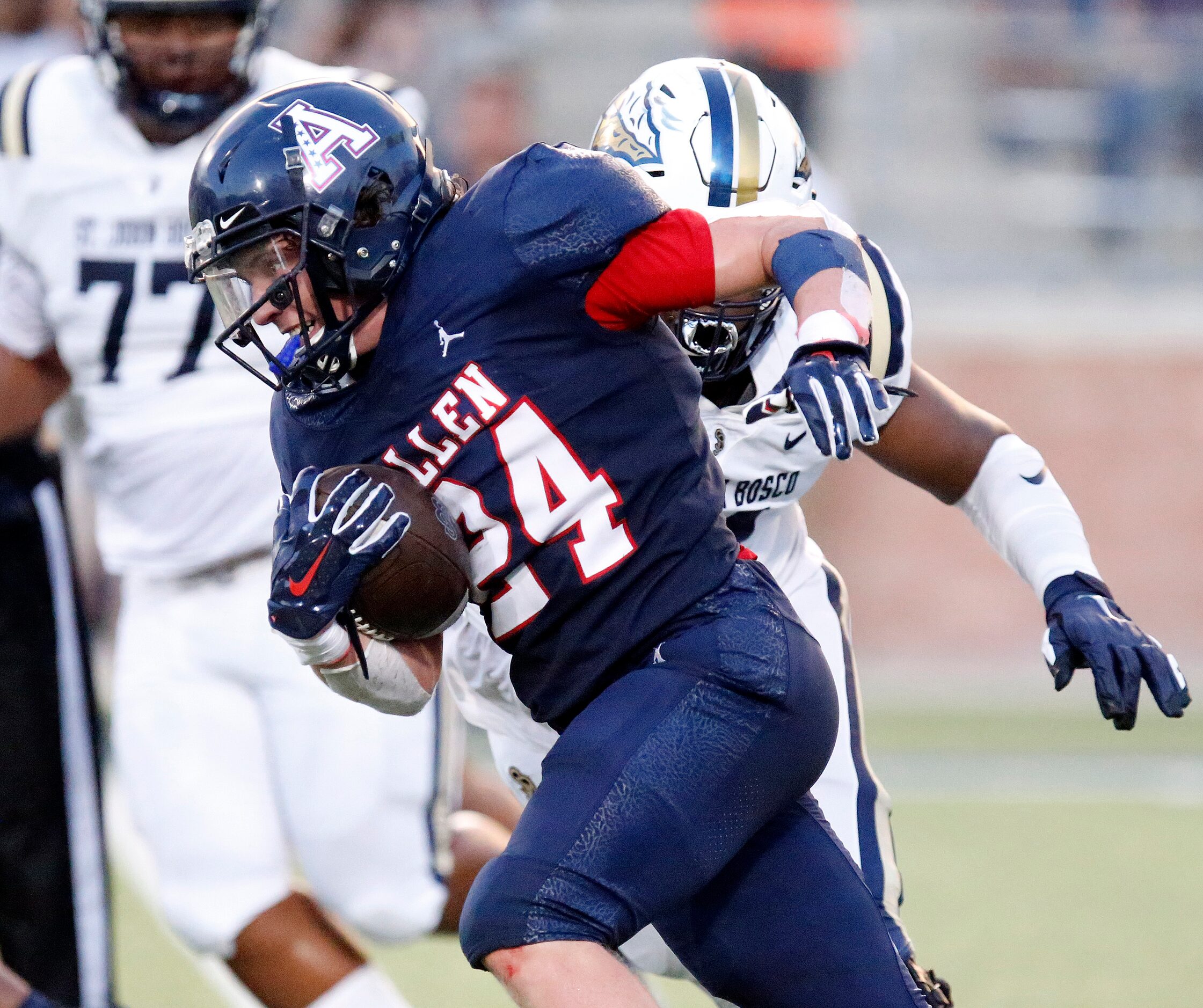 Allen High School linebacker Mitchell New (24) returns and interception during the first...