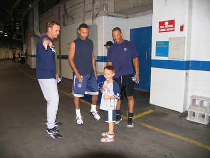 Al (left) and Jack Leiter (front) with Derek Jeter (middle) and Gary Sheffield (right).