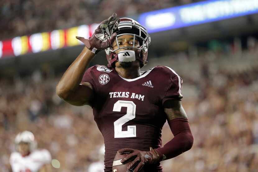 FILE - Texas A&M wide receiver Jhamon Ausbon (2) reacts after catching a touchdown during...
