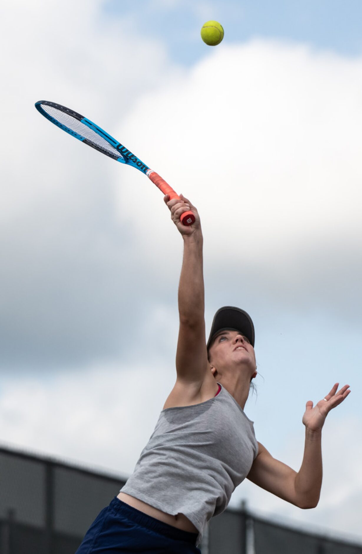 Midlothian Heritage's Haylie Hunger serves the ball in a singles match against...