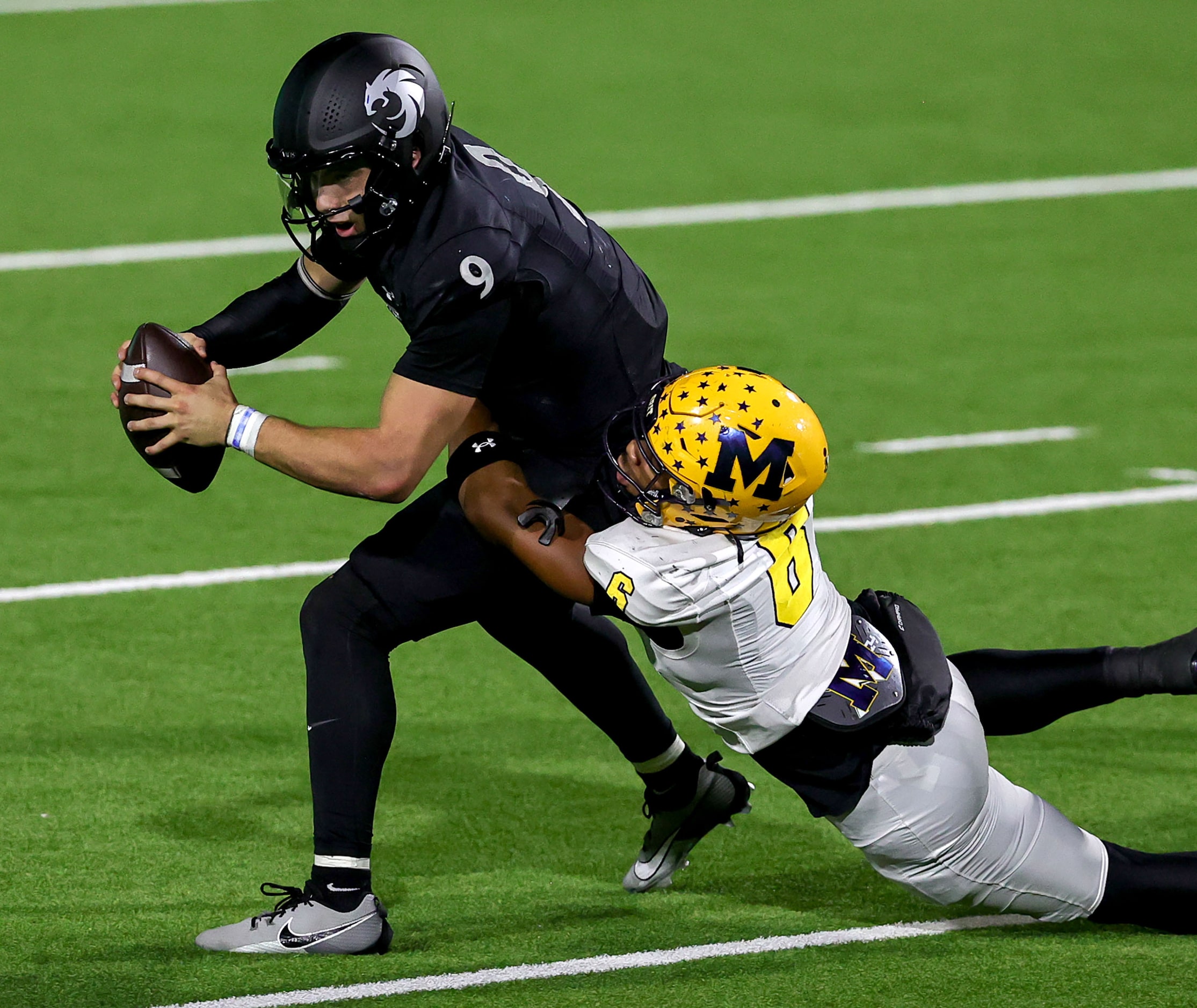 Denton Guyer quarterback Kevin Sperry (9) gets sacked by McKinney linebacker Kailer...