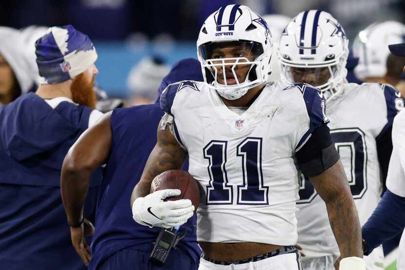 Dallas Cowboys linebacker Micah Parsons (11) walks to the bench after recovering a fumble...