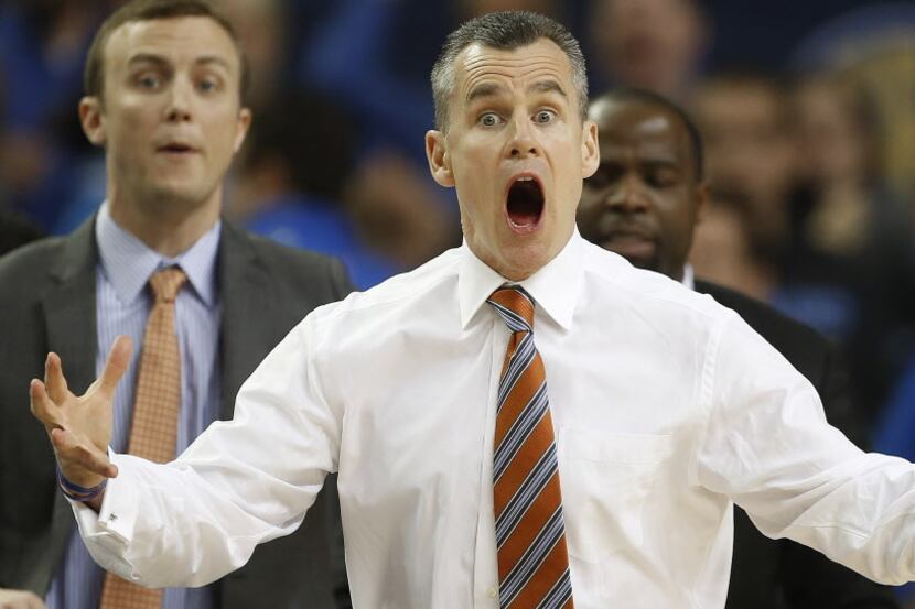 Florida head coach Billy Donovan reacts to play against Kentucky during the first half of an...