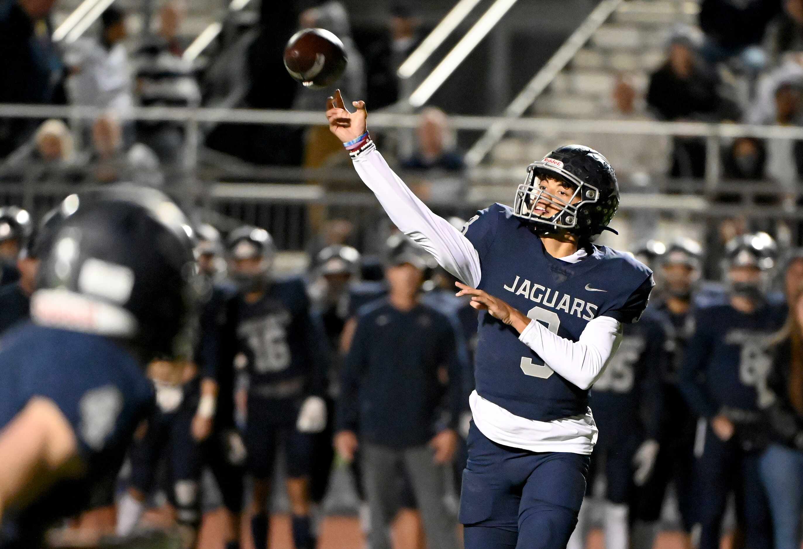 Flower Mound quarterback Nick Evers (3) throws a pass in the first half of a high school...