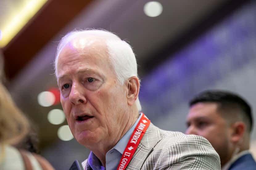 U.S. Senator John Cornyn, R-Texas, speaks with reporters during the Texas GOP convention at...