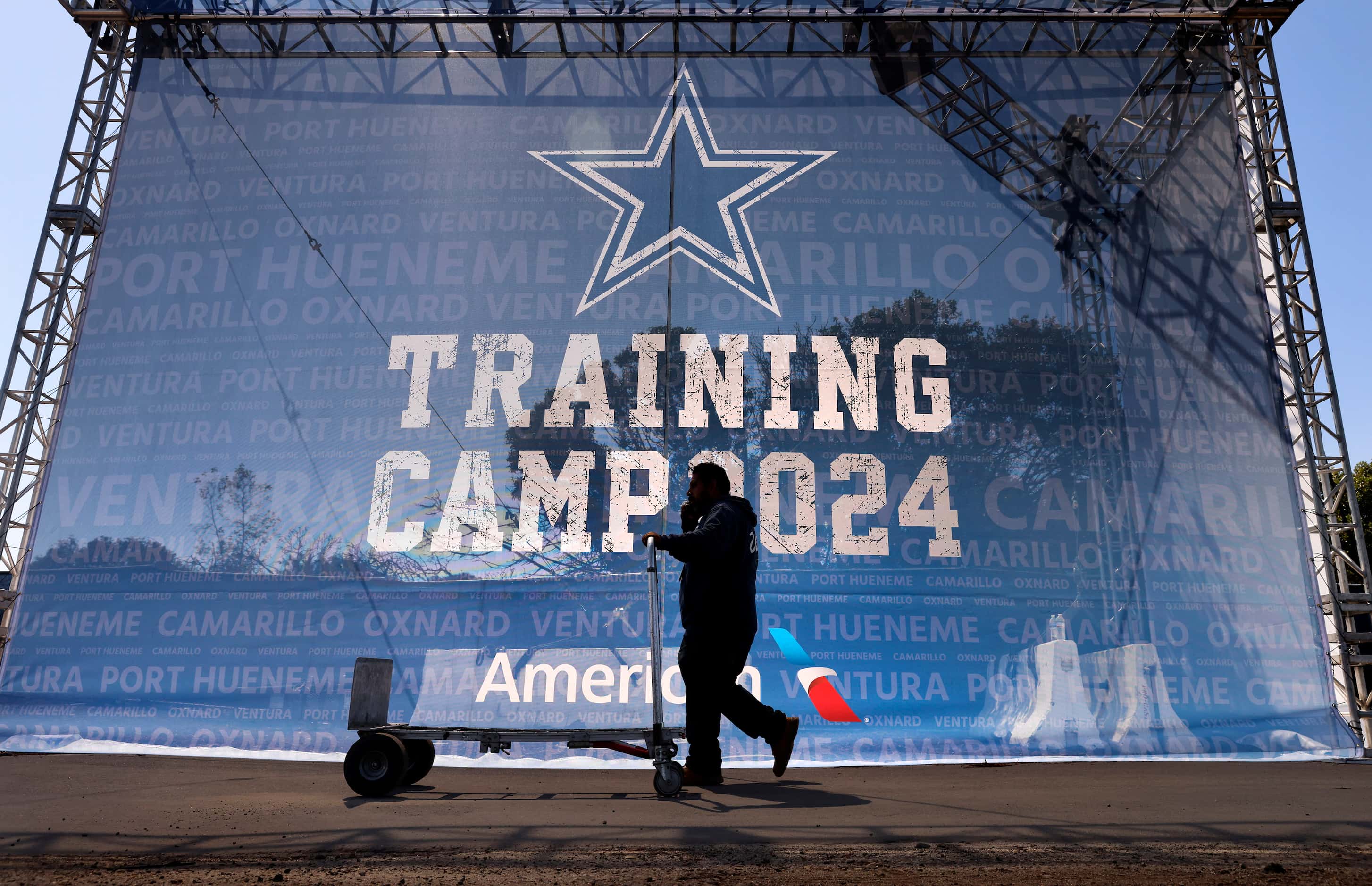 Workers continue to build out the 2024 Dallas Cowboys Training Camp at the Residence Inn...