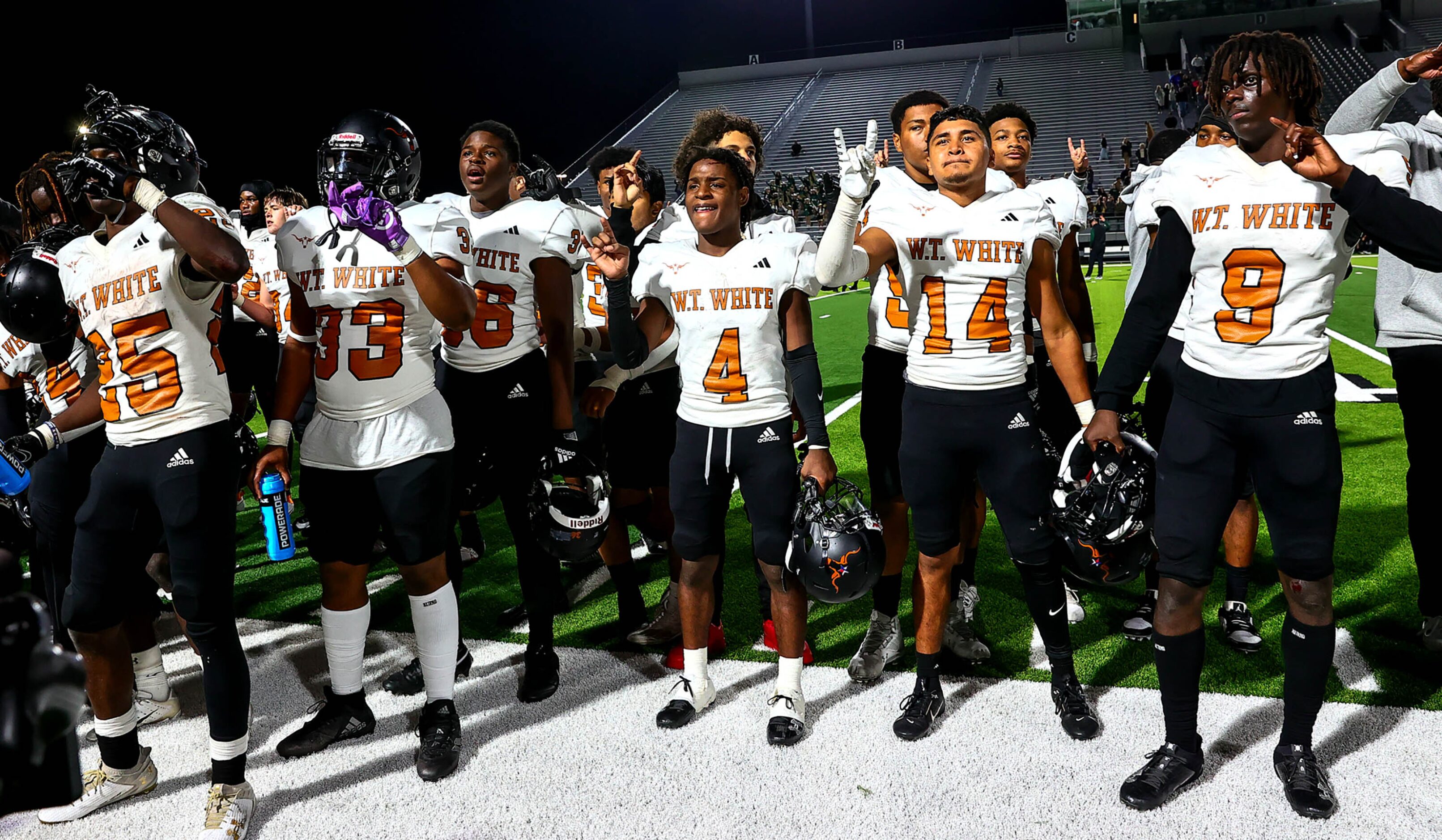 W.T. White Longhorns celebrate their victory over Birdville, 38-35 in overtime in a District...