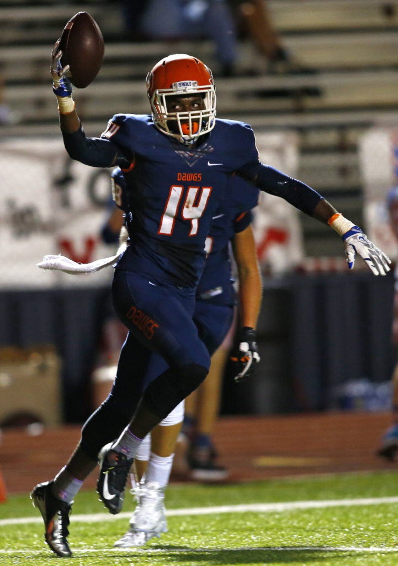 TXHSFB McKinney North defensive back Jamarrius Hill (14) celebrates his interception against...