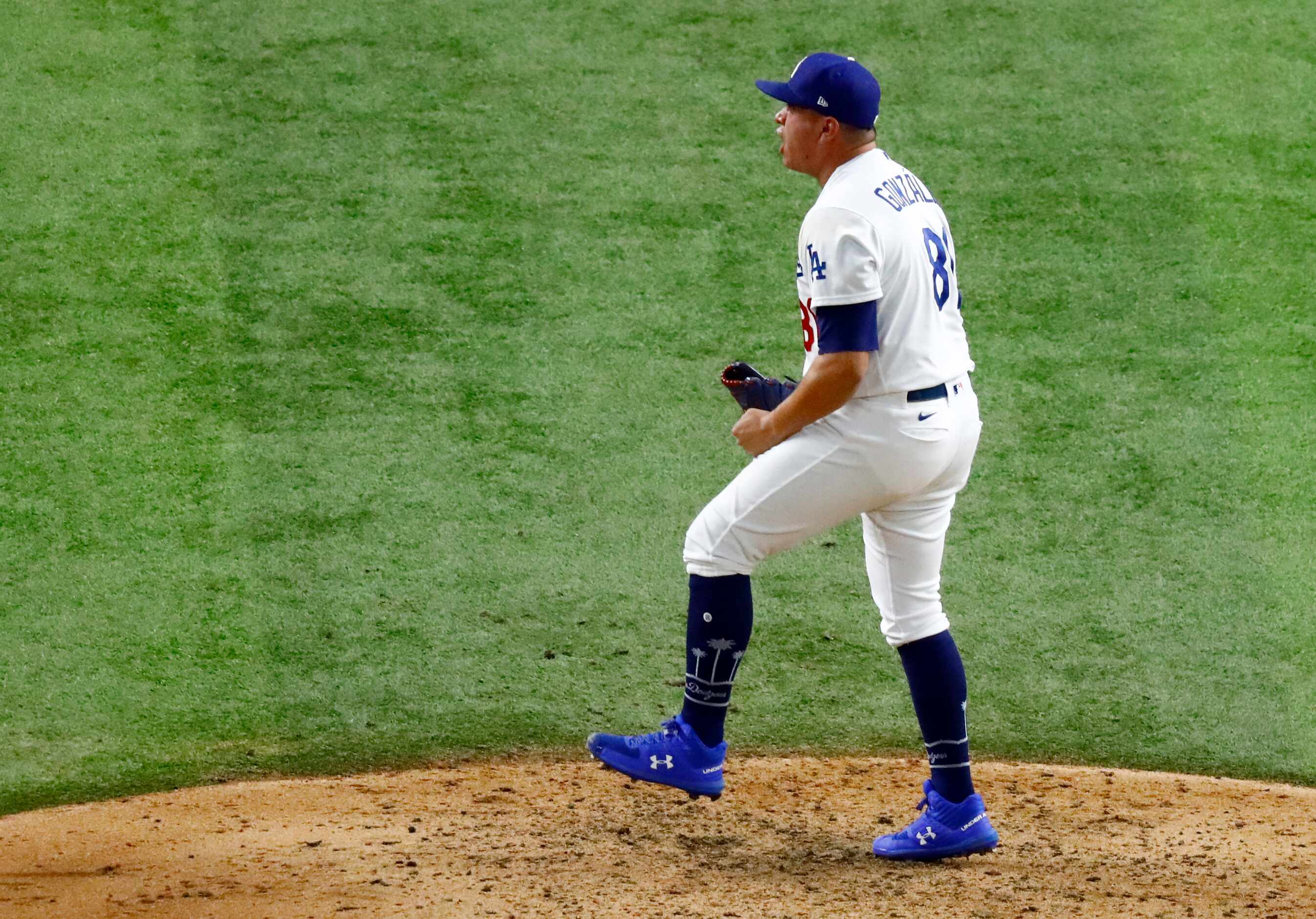 Los Angeles Dodgers pitcher Victor Gonzalez (81) reacts after striking out Tampa Bay Rays...