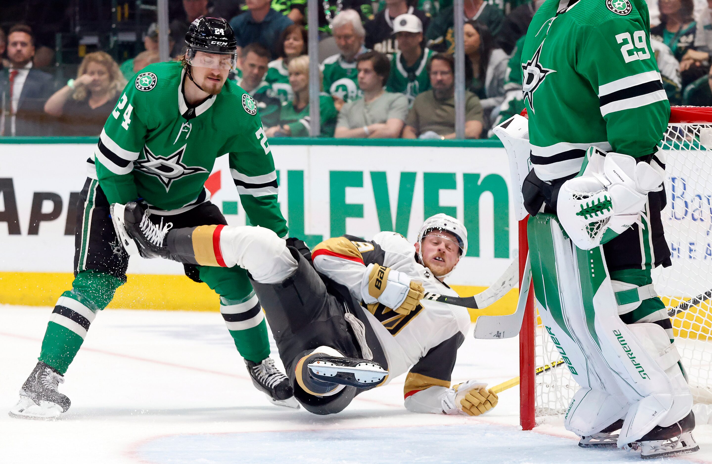 Dallas Stars center Roope Hintz (24) takes down Vegas Golden Knights center Jack Eichel (9)...