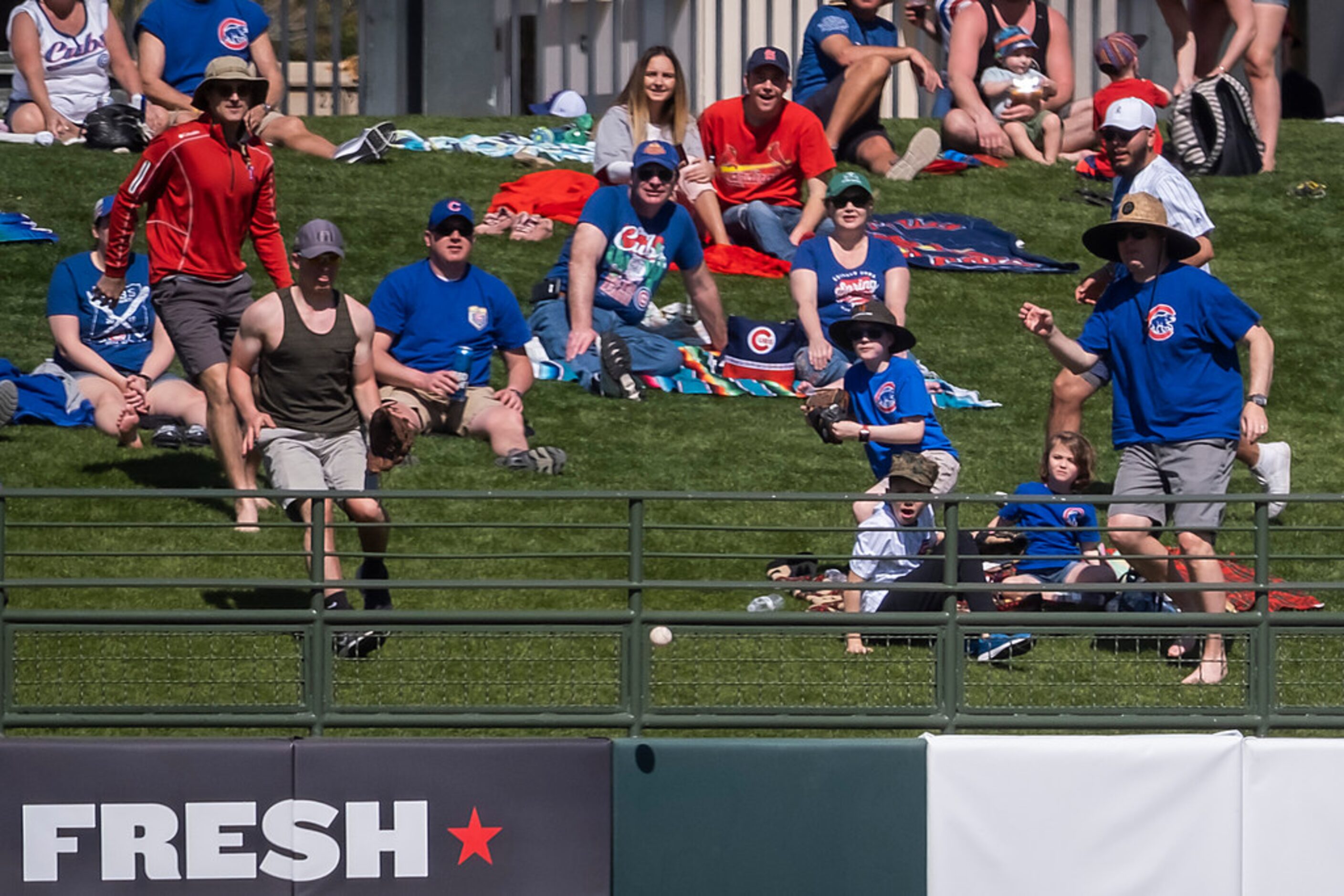 A ball off the bat of Texas Rangers shortstop Elvis Andrus hits the outfield railing for a...