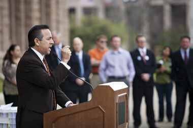 State senator Carlos Uresti spoke at a rally held outside on the steps of the State Capitol...