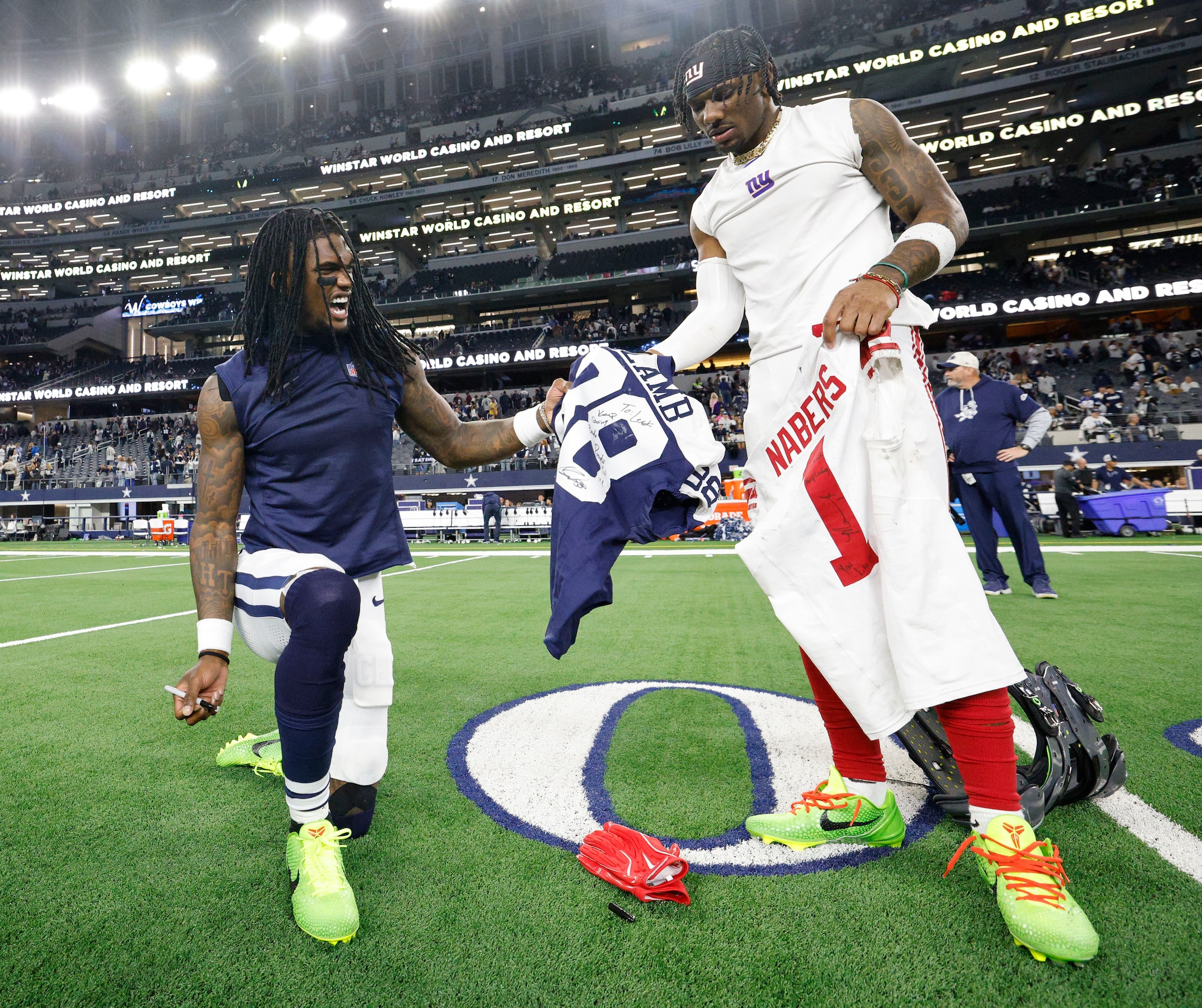 Dallas Cowboys wide receiver CeeDee Lamb (88), left, and New York Giants wide receiver Malik...