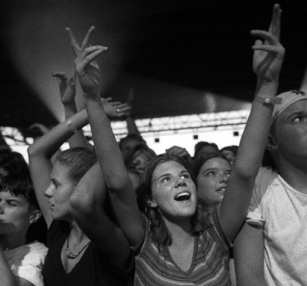 Beastie Boys fans watch the group  perform at Starplex for the 94 Lollapalooza concert. (DMN...