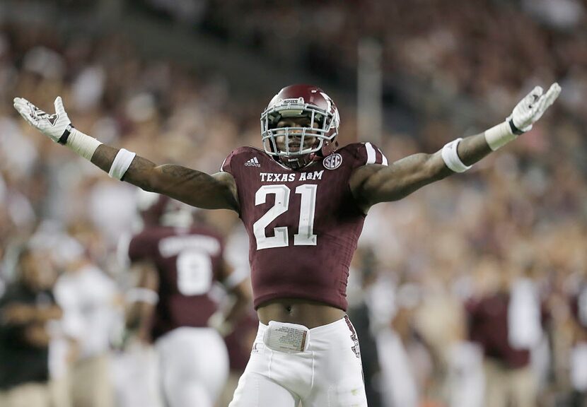 COLLEGE STATION, TX - OCTOBER 03: Brandon Williams #21 of the Texas A&M Aggies fires up the...