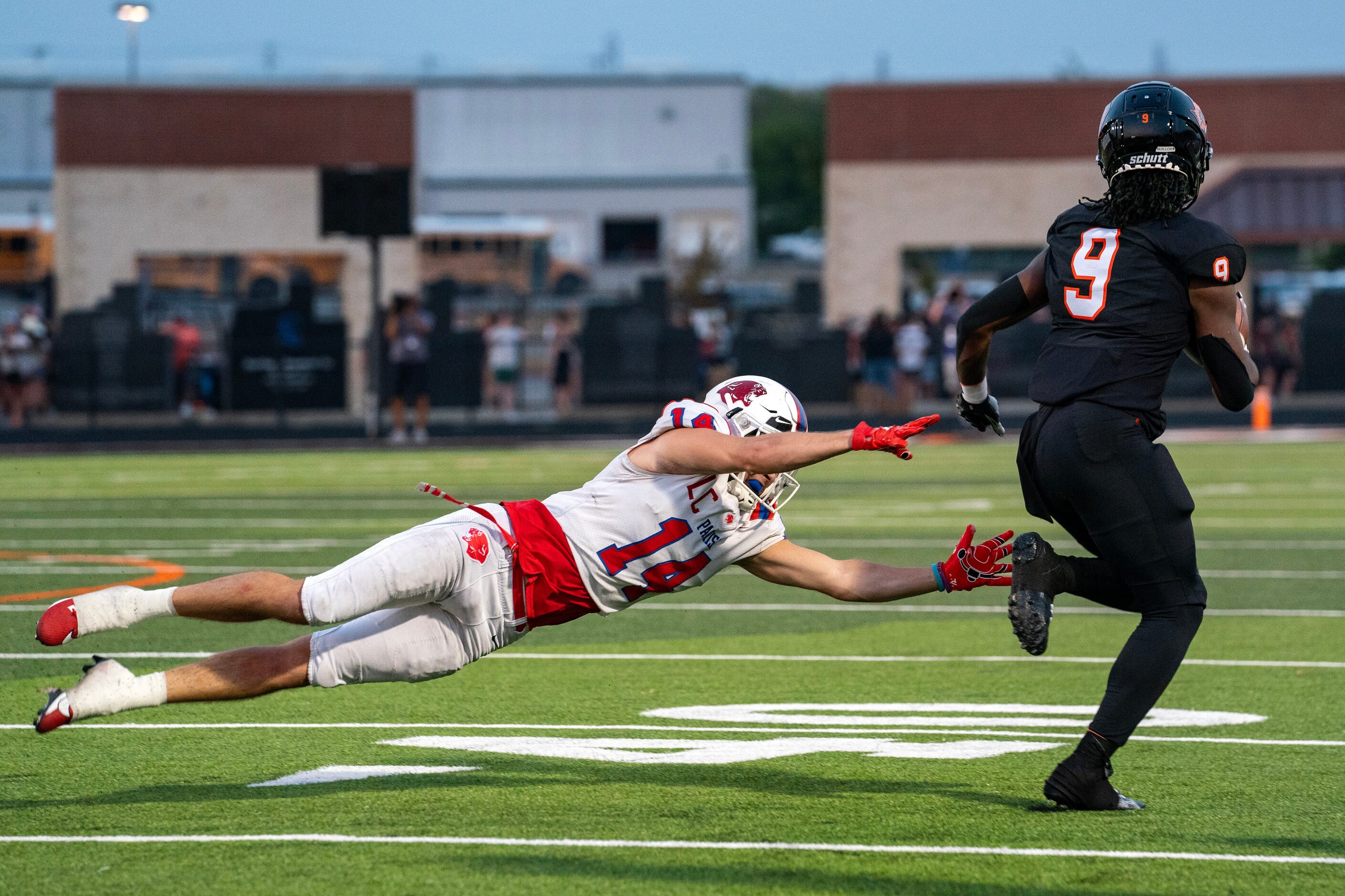 Parish Episcopal senior defensive back Mercer McDougal (14) dives but cannot reach Aledo...