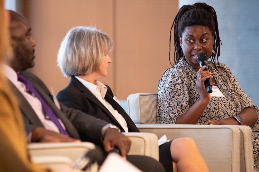 Joli Robinson (far right), president and CEO of Housing Forward, answered a question during...