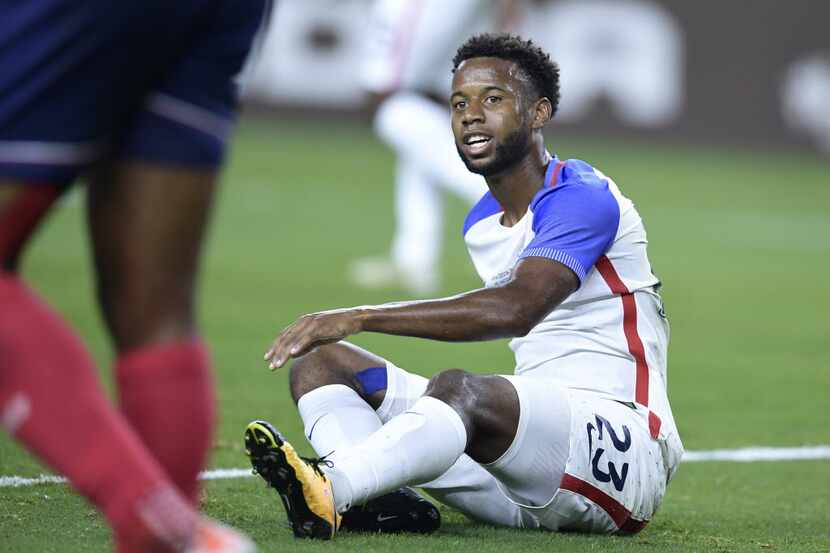 United States's midfielder Kellyn Acosta reacts after missing a close score during the...