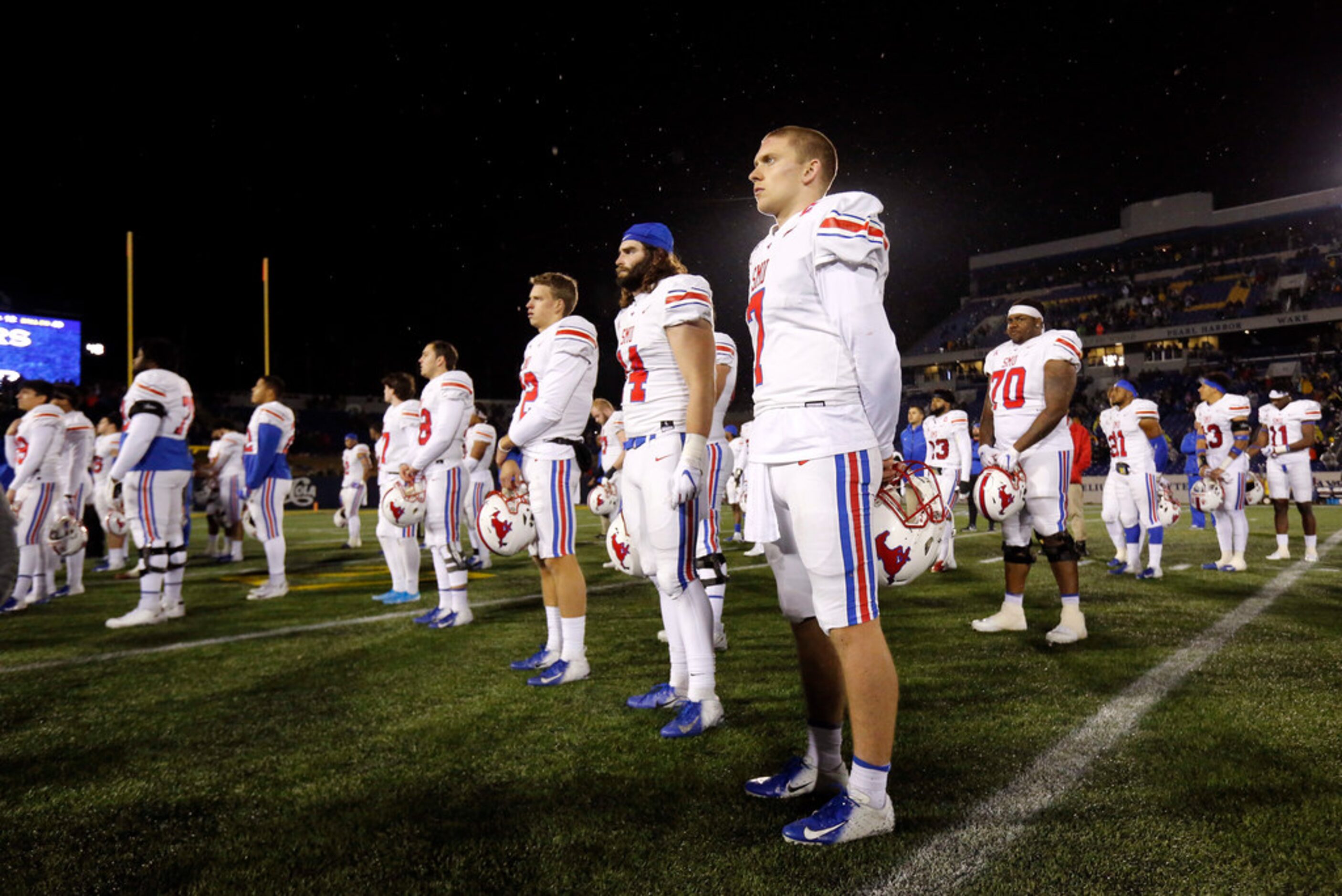 Southern Methodist Mustangs quarterback Shane Buechele (7) and the rest of the Mustangs...