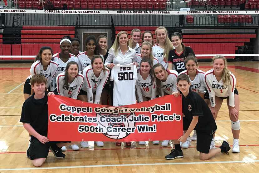 The banner says it all. Coppell coach Julie Price is surrounded by her team after defeating...