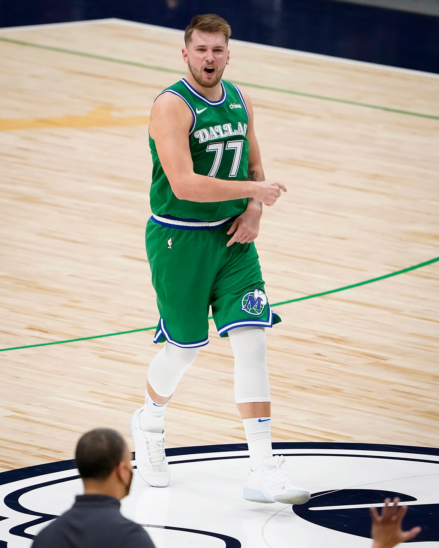 Dallas Mavericks guard Luka Doncic (77) celebrates after hitting a 3-pointer during the...