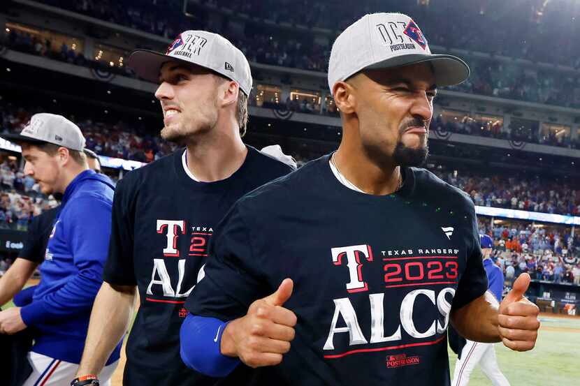 Texas Rangers second baseman Marcus Semien gives a thumbs up following their Game 3 win over...