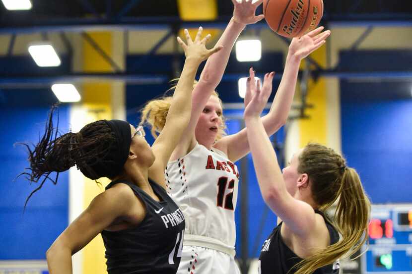 Argyle's Vivian Gray (12) finds an open teammate for an assist in a victory against...
