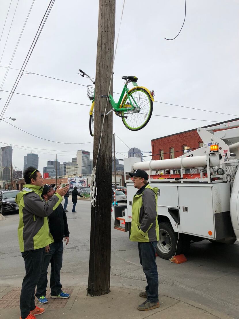 Someone sawed a LimeBike in half and bolted it to a Deep Ellum phone pole last month....
