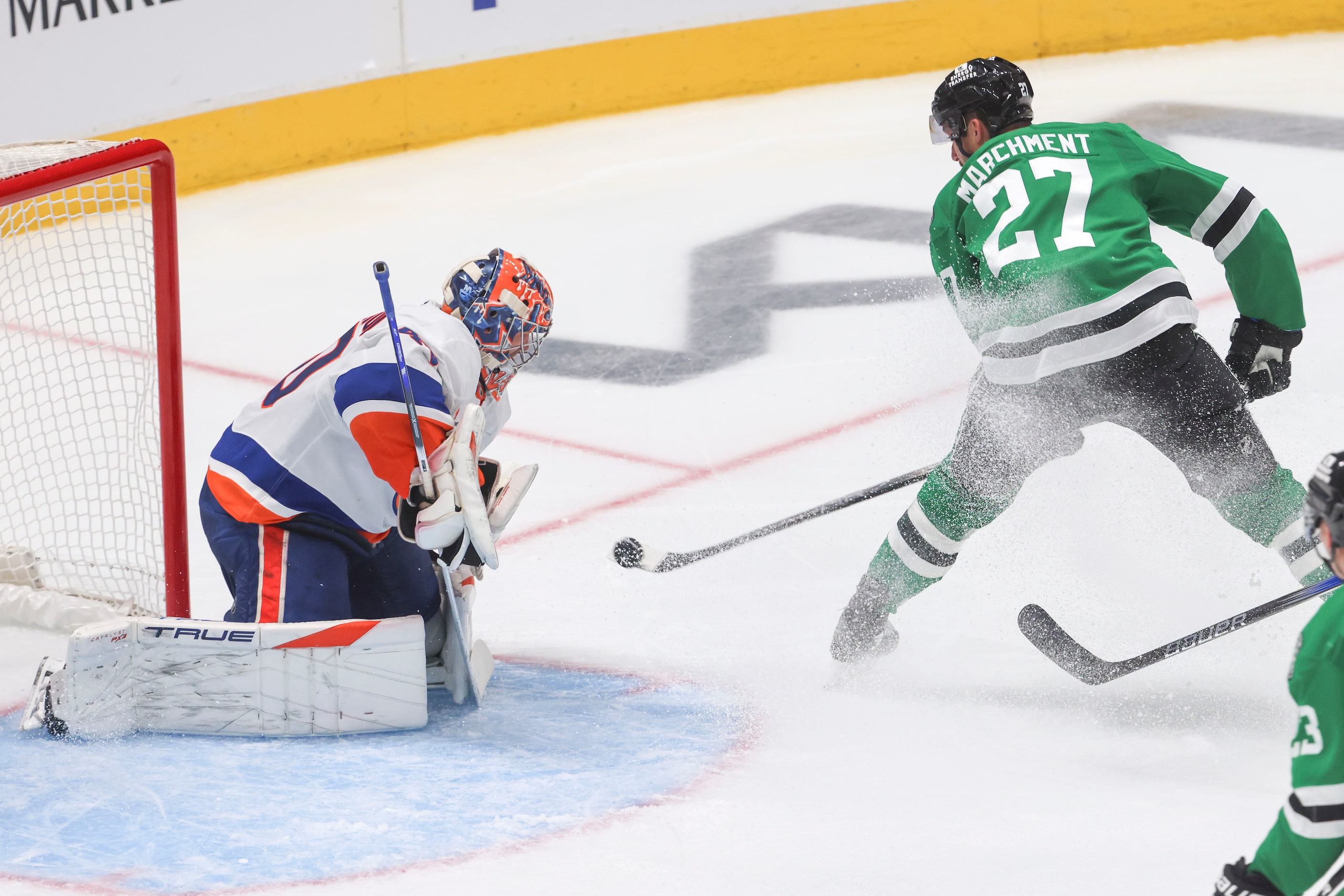 Dallas Stars left wing Mason Marchment (27) takes a shot against New York Islanders...