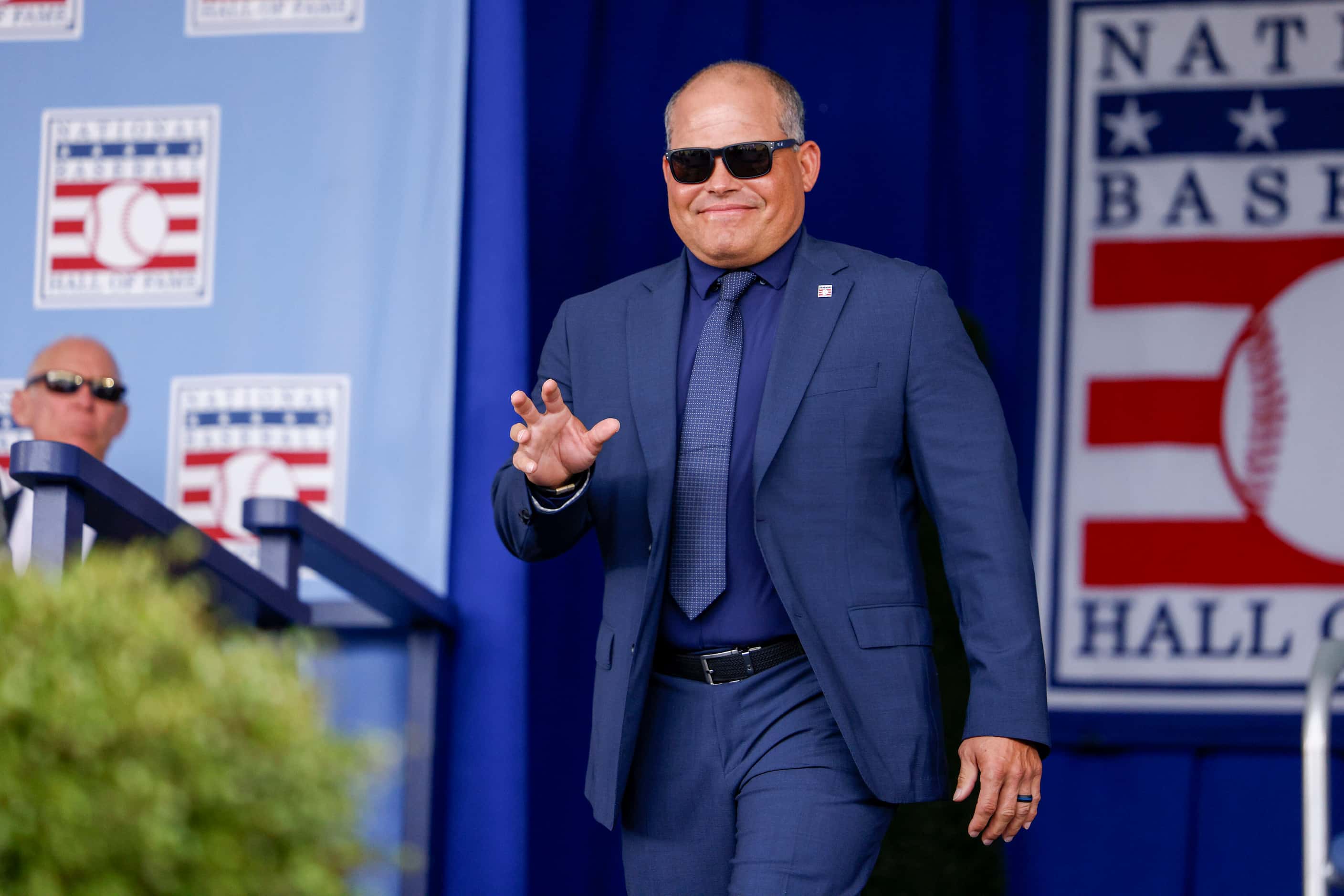 Hall of Famer Ivan 'Pudge' Rodriguez waves to the crowd during the National Baseball Hall of...