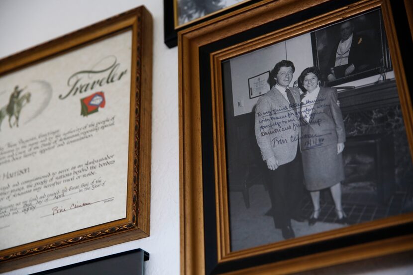 Adlene Harrison poses with President Bill Clinton in a photo from December 1986 that  hangs...