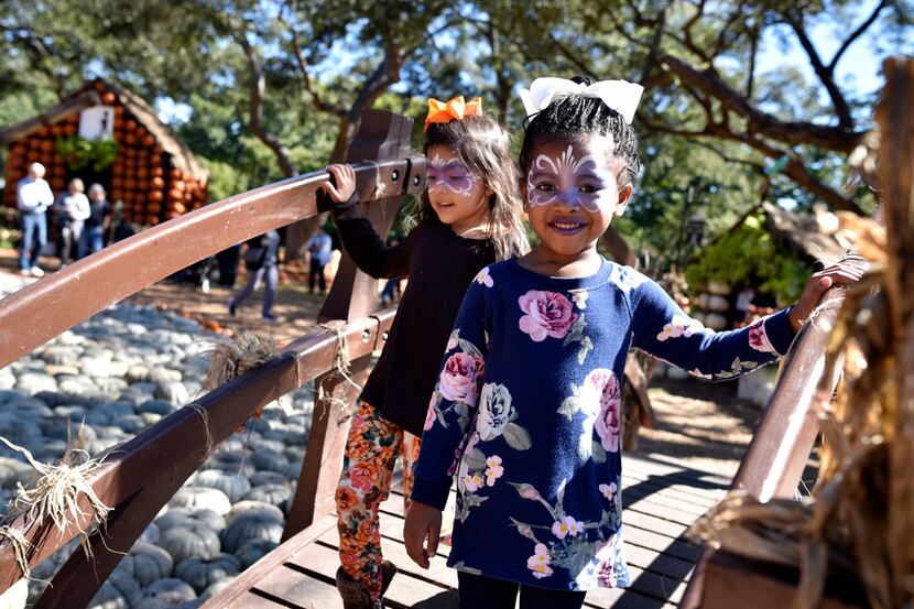 Mia Cervantes (left) and Jordyn Campbell, both of Mesquite, visited the Dallas Arboretum...
