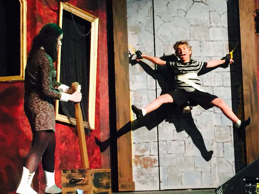 Meagan Black (Wednesday Addams) tortures her onstage brother Cameron Dinger (Pugsley) during...