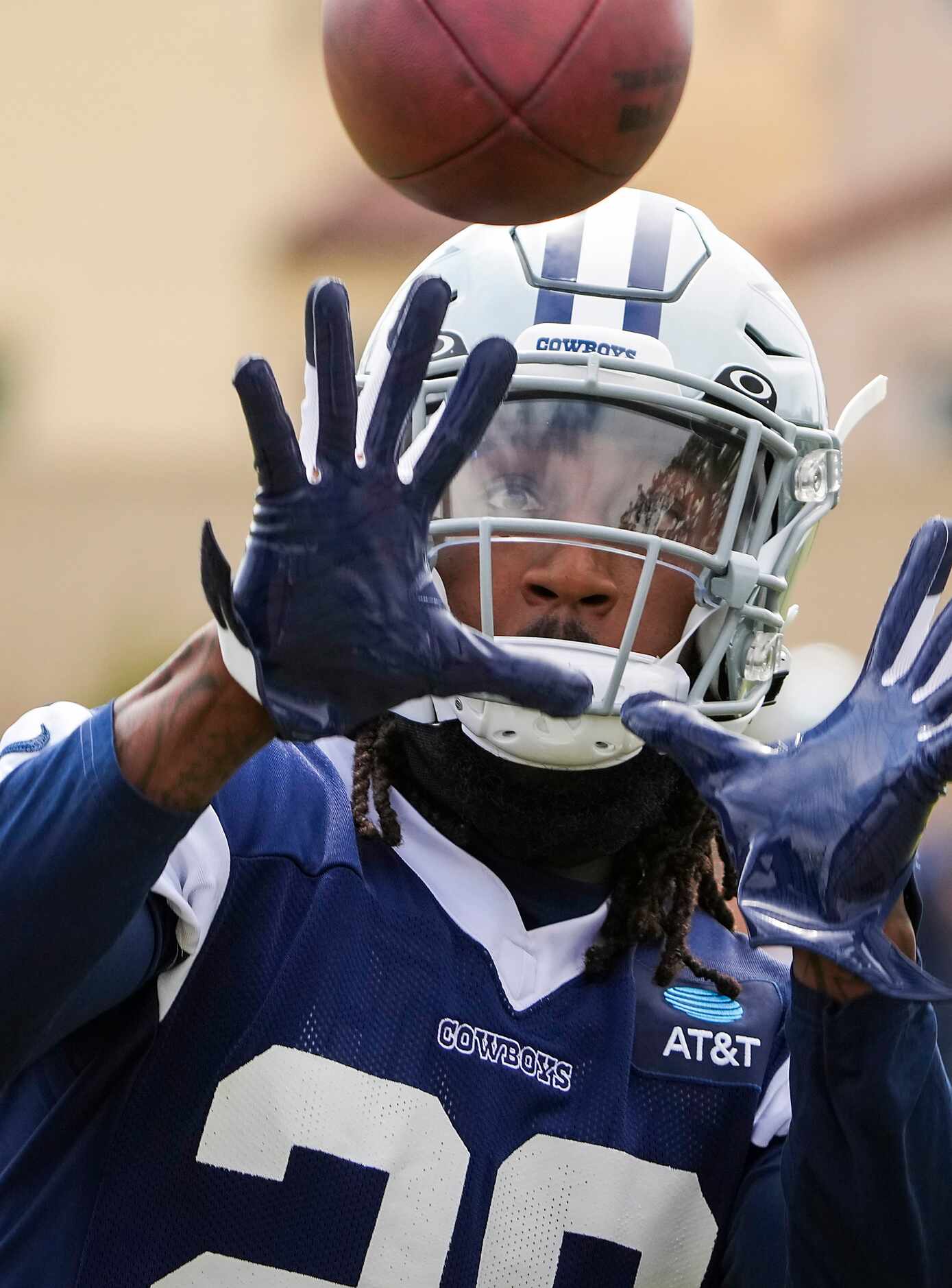 Dallas Cowboys safety Malik Hooker (28) makes a catch during a practice at training camp on...