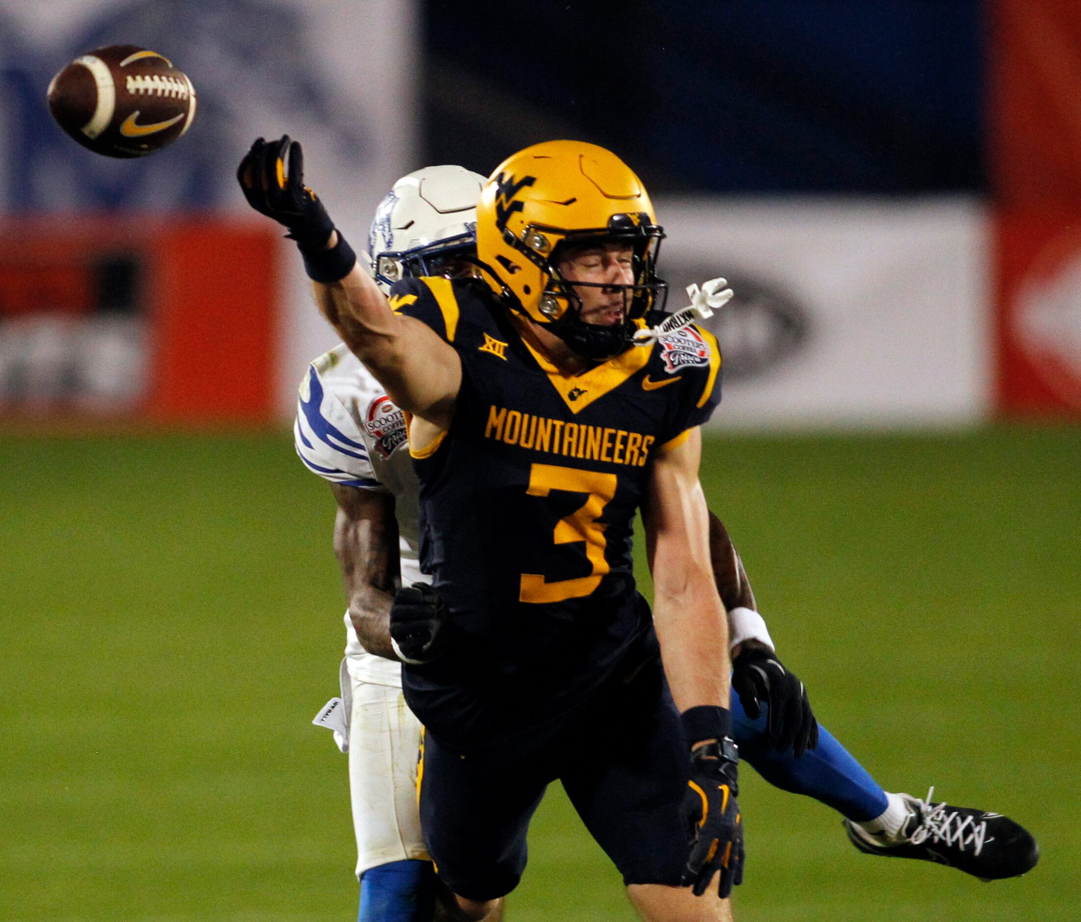 West Virginia receiver Hudson Clement (3) is unable to pull in a long pass as he is defended...