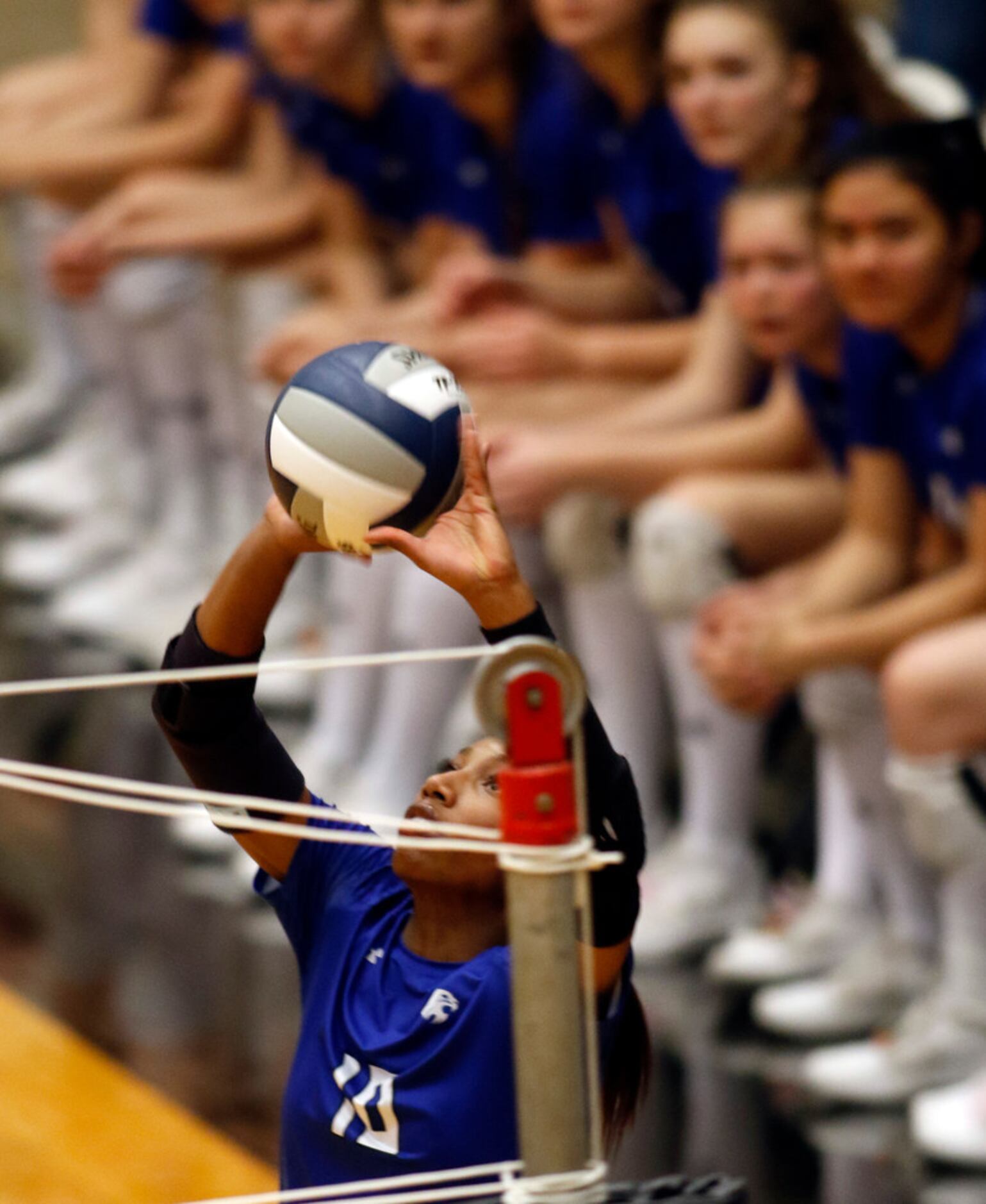 Trophy Club Byron Nelson outside hitter Charitie Luper (10) sets a teammate during the 2nd...