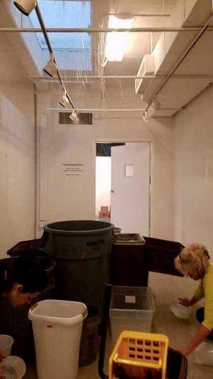 The art gallery in the Bath House Cultural Center is often crowded with receptacles to catch...