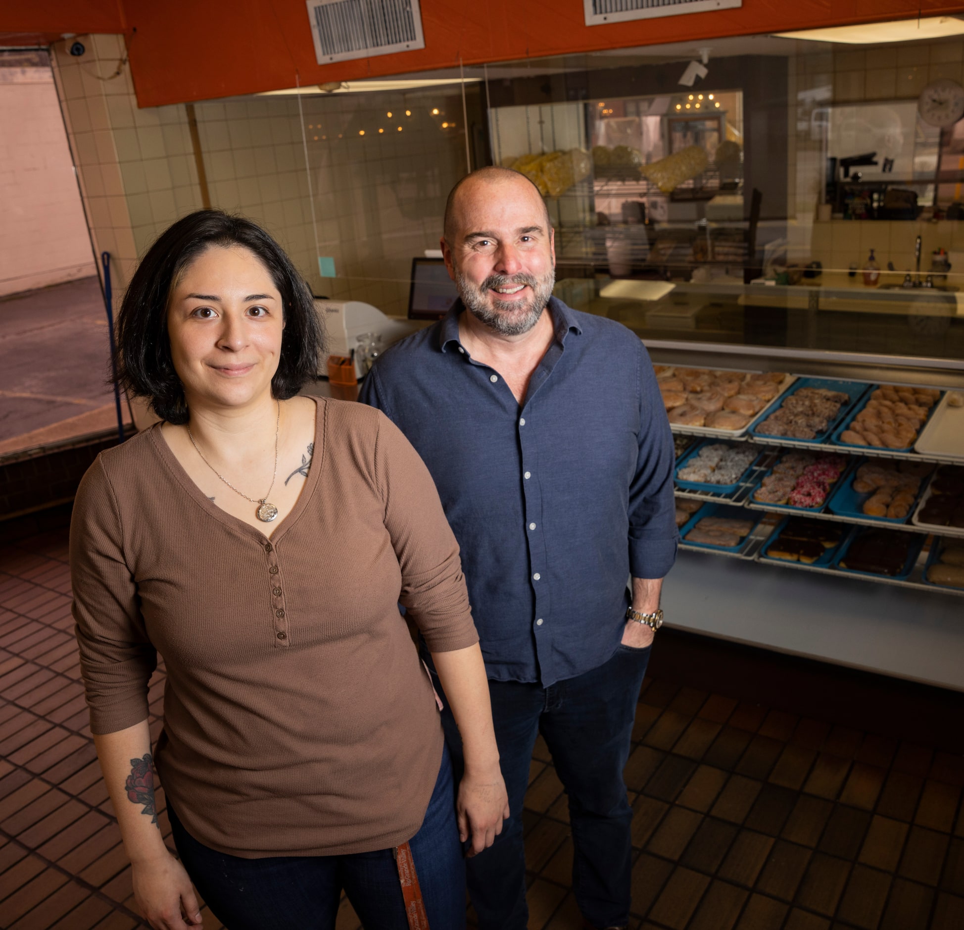 Restaurant manager Brianna Pantoja (left) and Lone Star CEO Marcus Johnson pose for a photo...