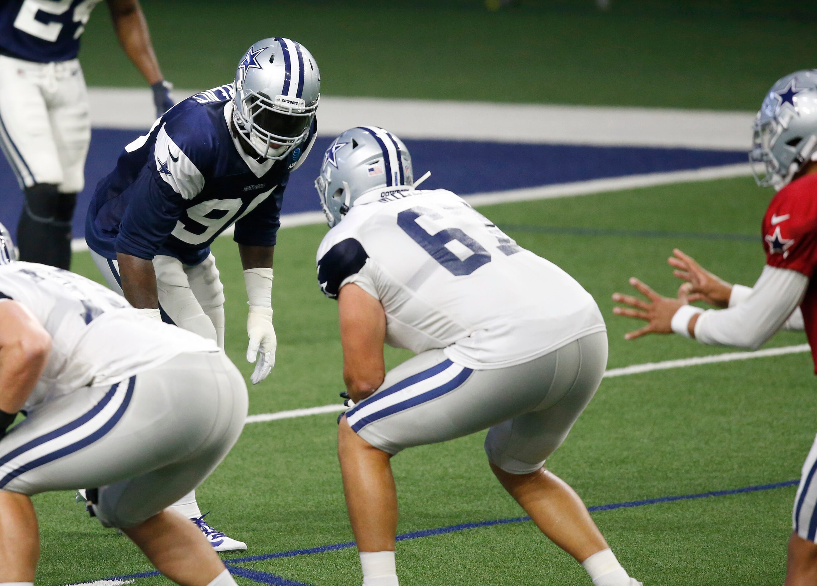 Dallas Cowboys defensive end DeMarcus Lawrence (90) before the snap during training camp at...