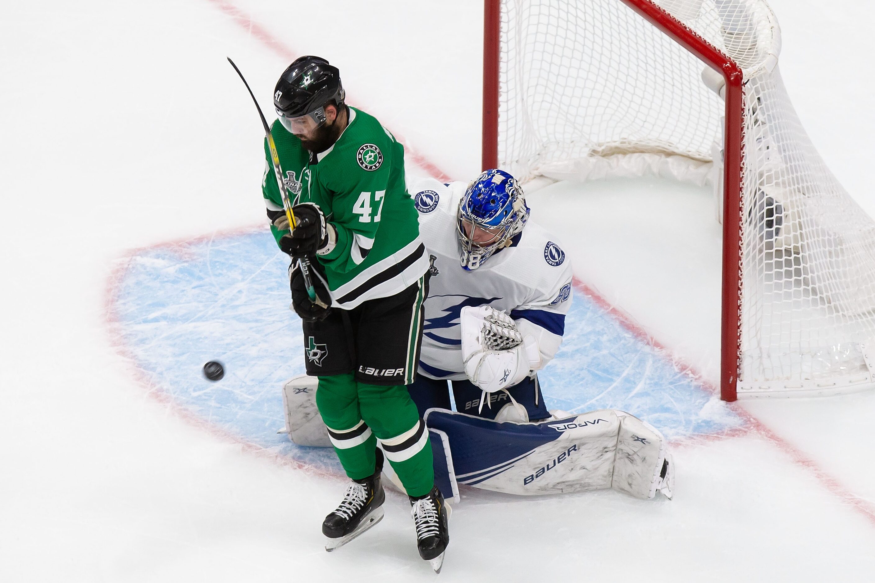 Alexander Radulov (47) of the Dallas Stars battles against goaltender Andrei Vasilevskiy...