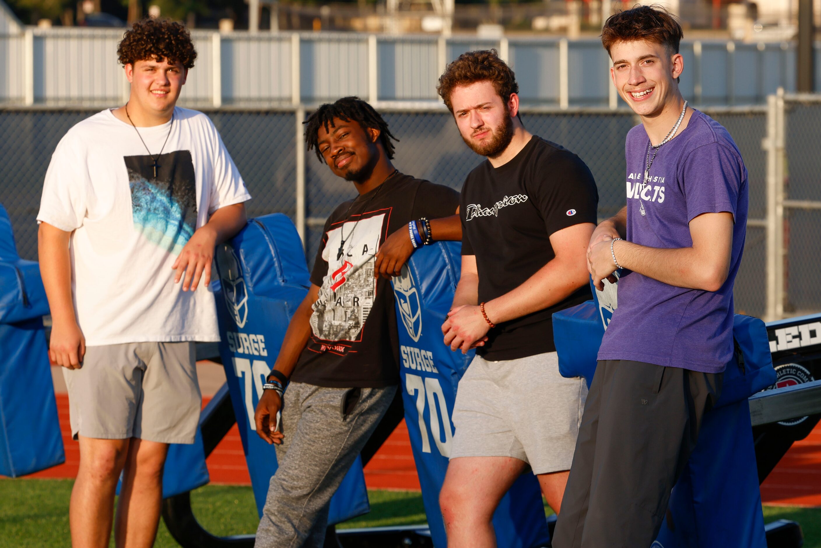 From left. L.D. Bell High School football players Matthew Garcia, Michael Woods, Evan...