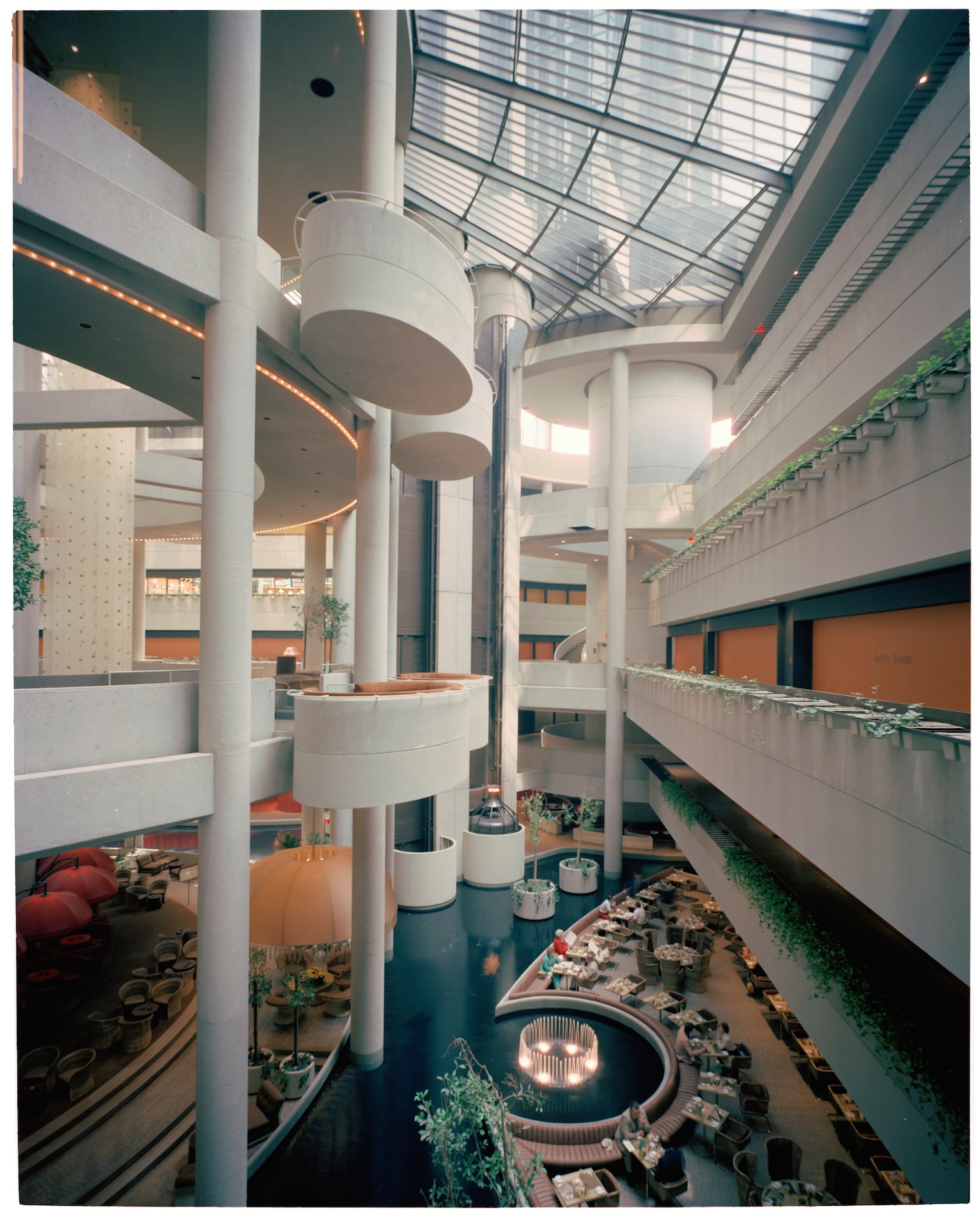 Thom captures the dizzying spaces on the interior of John Portman's 1977 Hotel Bonaventure,...